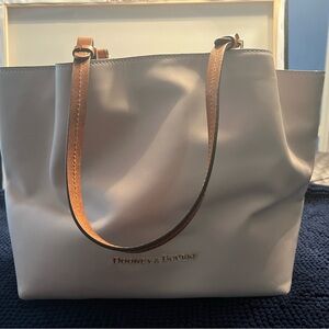 Ivory color Dooney and Bourke. Never used